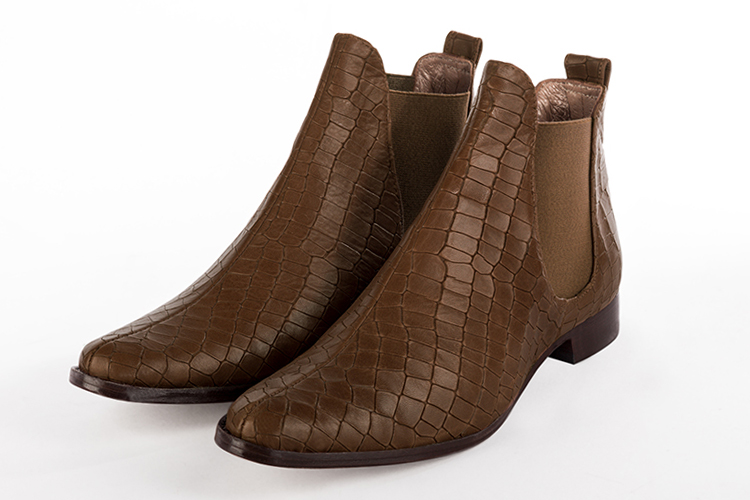 Caramel brown women's ankle boots with buckles. Round toe. Flat leather soles. Front view - Florence KOOIJMAN